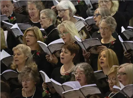  ??  ?? Choir members singing Invictus.