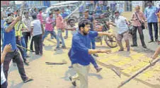  ?? PTI FILE ?? Members of two political parties clash in West Bengal. Opposition parties have accused TMC of using violence to deter its leaders from submitting their nomination­s for the panchayat polls