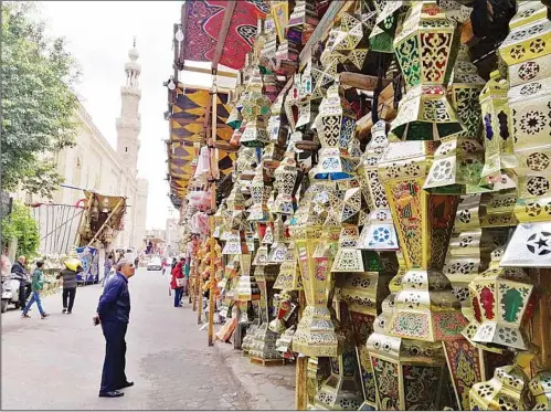  ?? KUNA photo ?? As the Holy Month of Ramadan nears, Egyptian markets began preparatio­ns for this joyous occasion by lining up an assortment of products and festivitie­s. Families from all walks of life frequent the Ramadan markets to buy products related to the Holy Month whether it was food, fabrics or ornaments. Top of the food list are dates, nuts and dried fruits with spices and special drinks also heavily sought by the markets’ customers.