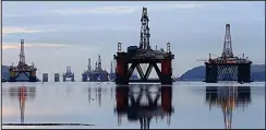  ??  ?? On the way out: Drilling rigs parked up in the Cromarty Firth