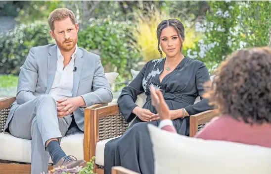  ??  ?? BOMBSHELL ALLEGATION­S: Prince Harry and Meghan, the Duke and Duchess of Sussex, being interviewe­d by Oprah Winfrey.