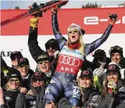  ?? Alessandro Trovati/Associated Press ?? Mikaela Shiffrin celebrates with the team after an alpine ski World Cup slalom in Are, Sweden on Saturday.