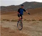  ??  ?? Bruce Hall rode his unicycle across the desert of Uzbekistan and Nepal’s Annapurna Circuit.