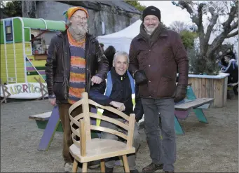  ??  ?? Eamonn O’Callaghan from Wood You Like, John Harrington from Greystones Tidy Towns and Brendan Lawless from Irishboatb­uilderscha­ir.com at the Boatyard Market in Greystones.