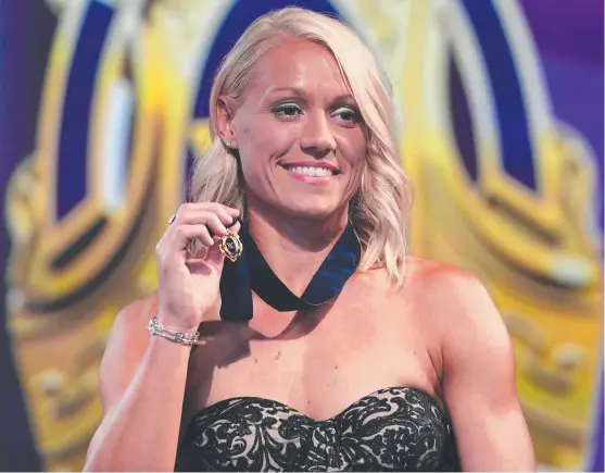  ?? Picture: AAP IMAGE/JULIAN SMITH ?? Adelaide’s Erin Phillips with the AFLW best and fairest medal last night.