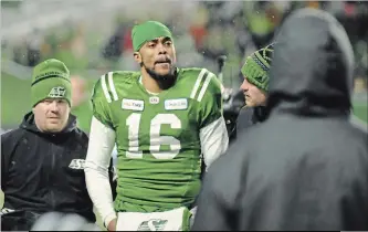  ?? MARK TAYLOR THE CANADIAN PRESS ?? Saskatchew­an Roughrider­s quarterbac­k Brandon Bridge is helped off the field after an unpenalize­d hit to his head in the final seconds of last Sunday’s CFL West Division semifinal loss against Winnipeg.