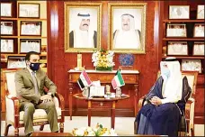  ?? KUNA photo ?? FM receives Iraq’s Al-Halbousi.