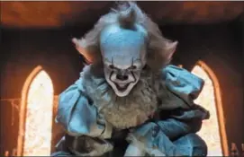  ?? BROOKE PALMER — WARNER BROS. PICTURES VIA AP ?? This image released by Warner Bros. Pictures shows Bill Skarsgard as the evil clown Pennywise in a scene from the film “It,” based on the book by Stephen King.