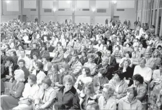  ??  ?? AN ANGRY PUBLIC Sacramento residents pack the Mira Loma High School cafeteria in 1977 for an update on the police hunt for the rapist. Detectives scanned the audience, convinced that he would show up.