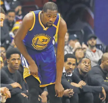  ?? GEOFF BURKE, USA TODAY SPORTS ?? Kevin Durant is out indefinite­ly with a medial collateral ligament sprain in his knee.