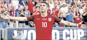  ?? Getty Images ?? STAR SIGN: Eighteen-year-old Christian Pulisic (left) scored twice and gave the U.S. men’s soccer team a glimpse into his bright future during a win over Trinidad and Tobago on Thursday night.