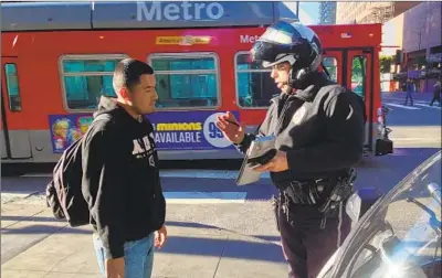  ??  ?? DATA from five LAPD divisions shows that jaywalking tickets are much more common than “failure to yield” tickets.