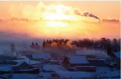  ?? ANDREY RUDAKOV / BLOOMBERG FILES ?? Yakutsk, in Siberia, one of Earth’s coldest cities, is seeing the start of warming that could lead to the destructio­n of infrastruc­ture and the revival of dormant diseases.