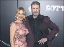  ?? CHARLES SYKES — THE ASSOCIATED PRESS ?? Kelly Preston and John Travolta attend the premiere of “Gotti” on June 14, 2018,at the SVA Theatre in New York. Preston, whose credits included the films “Twins” and “Jerry Maguire,” died Sunday her husband Travolta said. She was 57.