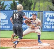  ?? Courtney Couey, Ringgold Tiger Shots ?? Ringgold first baseman Austin McMahan keeps his eye on the ball as he gets set to make a catch against North Murray last week. The Tigers will win the Region 6-AAA title with two wins in their final three games this week.