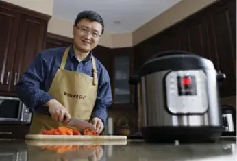  ?? BLAIR GABLE ?? Instant Pot mastermind Robert Wang was a telecom engineer before moving into kitchen appliances in 2008.