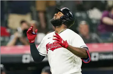  ?? TONY DEJAK — THE ASSOCIATED PRESS ?? The Indians’ Franmil Reyes celebrates after hitting a solo home run during the seventh inning against the Rangers on Aug. 25 in Cleveland.