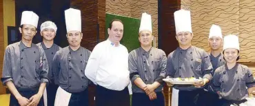  ??  ?? The Bellevue Manila’s outstandin­g team of chefs. (From left) Edwin Balderama, Jerico Rivera, Rolly Capile, chef Stephan Oppenhagen, Gary Miranda, Raymond Santos, Ferdinand Bogabil and Cristine Perana.
