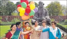  ?? PTI PHOTO ?? Congress MPS release balloons in Parliament on the occasion of Internatio­nal Women's Day in New Delhi on Thursday.