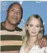  ??  ?? Dwayne Johnson and Emily Blunt