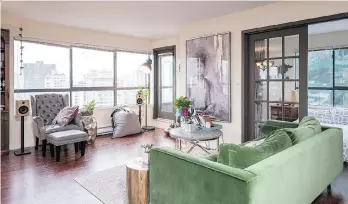  ?? PHOTOS: PNG MERLIN ARCHIVE ?? This two-bedroom, one-bathroom condo on Alberni Street in Vancouver sold for $935,000. The unit boasts two balconies, each with a panoramic view of the city.