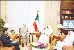  ?? KUNA photo ?? Acting Prime Minister and Foreign Minister Sheikh Sabah Al-Khaled Al-Hamad Al-Sabah received at Seif Palace on Monday Minister of Justice and Awqaf and Islamic Affairs Yaqoub Al-Sanea, accompanie­d by visiting Algerian Minister of Justice Al-Tayeb Louh...