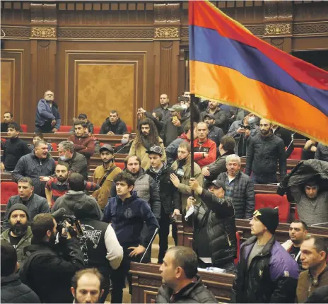  ?? AP ?? Armenia’s opposition said it had not been consulted about the late-night deal to halt the fighting over Nagorno-Karabakh