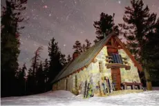  ?? Ariel Rabin/Yosemite Conservanc­y ?? The 81-year-old Ostrander Ski Hut in Yosemite’s backcountr­y, closed for two years, is accessible via a 10-mile ski journey.