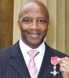  ??  ?? Cyrille Regis with his MBE in 200