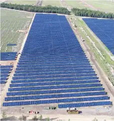  ?? Photo: APA Group ?? JOBS FEARS: The under-constructi­on Darling Downs Solar Farm, as seen from the air earlier this year.