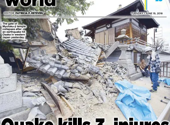  ?? AP ?? The gate of Myotoku-ji temple collapses after an earthquake hit Osaka in western Japan yesterday.