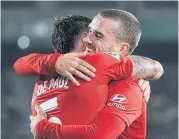  ?? AFP ?? Atletico Madrid’s Rodrigo De Paul, left, celebrates his goal with teammate Antoine Griezmann.