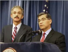  ??  ?? California Attorney General Xavier Becerra (right) is backed by Los Angeles City Attorney Mike Feuer during a press conference in Los Angeles on Tuesday. AP PHOTO/MIKE BALSAMO