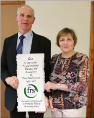  ??  ?? Rose McCarthy (Accounts Manager) making a presentati­on to Dan O’ Riordan (Manager) at the FRS 40th Anniversar­y celebratio­n in Kanturk.