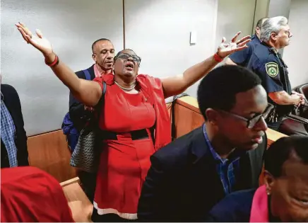  ?? Tom Fox / Dallas Morning News ?? Allison Jean rejoices Tuesday after fired Dallas police officer Amber Guyger is found guilty of murder in the shooting death last year of her son Botham in his own apartment. Guyger says she mistook his apartment for her own.