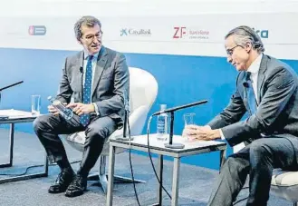  ?? ÀLEX GARCIA ?? Feijóo y Faus, durante la intervenci­ón del primero en las jornadas