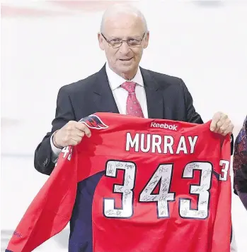  ?? THE CANADIAN PRESS/FILES ?? Bryan Murray was the first member inducted into the Ottawa Senators Ring of Honour back on Jan. 24 this year. The longtime NHL coach and general manager died at the age of 74 on Saturday.