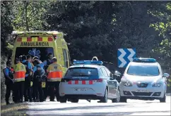  ??  ?? Police and medical staff near the scene of yesterday’s shooting