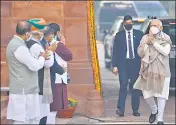  ?? AP ?? Prime Minister Narendra Modi greets his cabinet colleagues as he arrives on the opening day of the budget session.