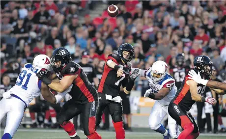  ?? JUSTIN TANG/THE CANADIAN PRESS ?? Redblacks quarterbac­k Trevor Harris put up huge yardage and completion numbers against the Alouettes.