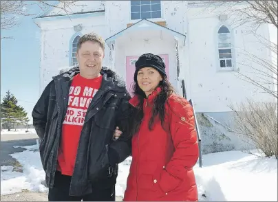  ?? SHARON MONTGOMERY-DUPE/CAPE BRETON POST ?? Corrina Kelly and her husband, Mike Kelly, of New Waterford, stand in front of the former St. James Catholic Church in Gardiner Mines which they have purchased. Corrina said after living away from Cape Breton for 20 years they moved home to retire and...