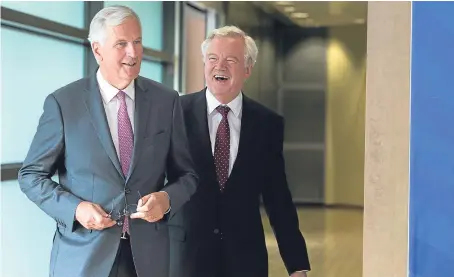  ?? Picture: AP. ?? EU chief Brexit negotiator Michel Barnier, left, and Brexit Secretary David Davis in Brussels.