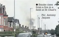  ??  ?? Smoke rises from a fire in a field at St Chad’s Pic: Antony Jaques