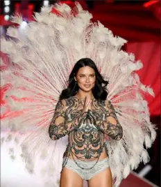  ?? Getty Images for Victoria's Secret ?? Adriana Lima walks the runway during the 2018 Victoria’s Secret Fashion Show. The show marked her last one for Victoria’s Secret after 20 years modeling for the brand.