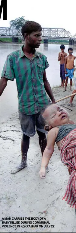  ??  ?? AMAN CARRIES THE BODYOFA BABYKILLED DURING COMMUNAL VIOLENCE IN KOKRAJHAR ON JULY 22