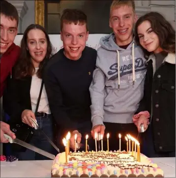  ??  ?? Conor, Amy, Cian, Rory and Dearbháil Cassidy enjoying their birthday cake.