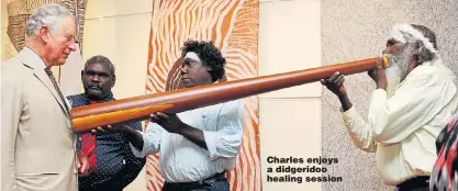  ??  ?? Charles enjoys a didgeridoo healing session