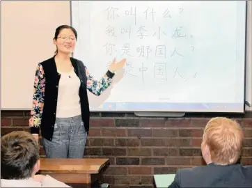  ??  ?? NEW GLOBAL TAKE: Mandarin teacher Jing Wang with her Grade 8 class at Kearsney College. Wang, from Beijing, has just joined the school as part of a partnershi­p with the HanBan Confucius Institute in China. But the writer says we should not neglect our...
