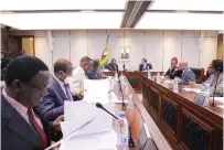  ?? ?? Foreign Affairs and Internatio­nal Trade Minister Fredrick Shava, Commonweal­th head of delegation assistant Secretary General Professor Luis Franceschi, members of the delegation and other government ministers follow proceeding­s during a meeting in Harare yesterday