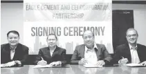  ?? PHOTO FROM EAGLE CEMENT ?? Eagle Cement and EEI Corp. ink partnershi­p. (From left) Ed Uy, Eagle Vice president for sales and marketing; Manny Teng, chief operating officer and general manager; Roberto Jose Castillo, EEI president and chief executive officer; and Edwin...